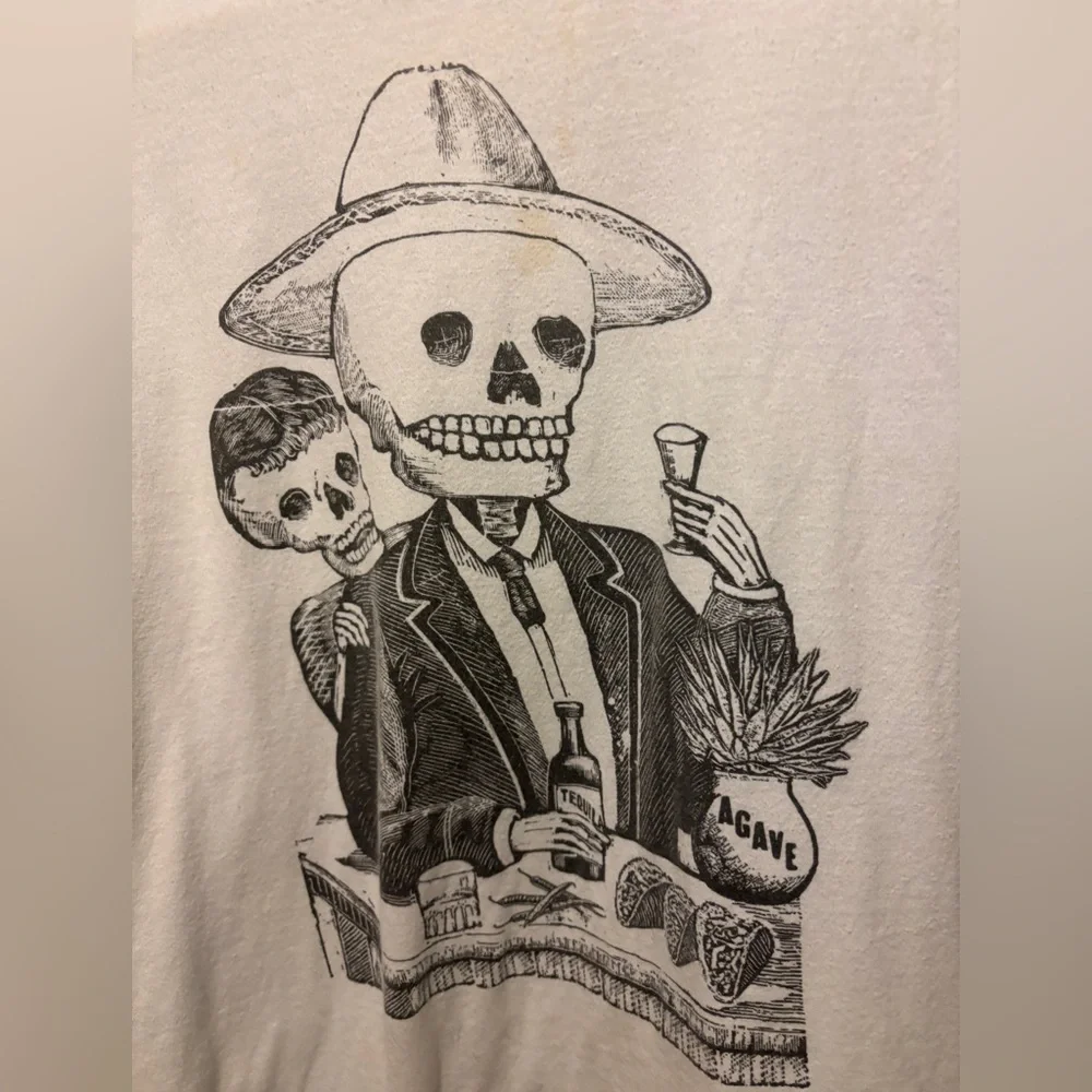 Mexican skull shirt bout at Disney’s Epcot park. - Picture 2 of 4
